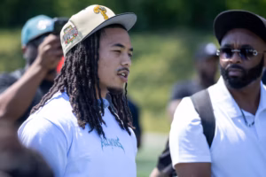 Eagles rookie Makai Lemon attends Open Door Abuse Awareness and Prevention football combine to inspire the youth