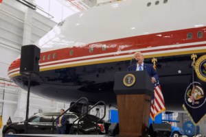 President Donald Trump unveils the new Air Force One, a converted Qatari jet