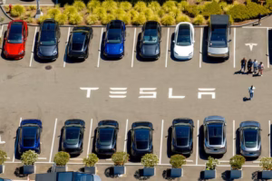 Top auto regulator opens special probe after a Tesla slams into a Texas home, killing a woman