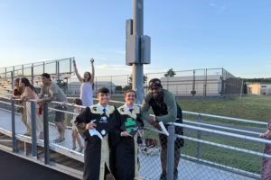 Two Deptford High School students created a Jalyx Hunt fan account. Then he showed up at their graduation.