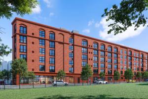 After years of delay, a Francisville apartment building is under construction