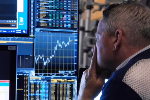 Stocks waver on Wall Street while crude oil prices fall for the first time in a week