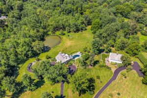 A 27-acre compound with two homes and pools is for sale for $9 million in Chester County