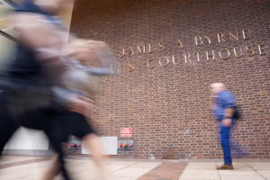 Haverford professor accused of sending antisemitic threats to a colleague is detained until trial